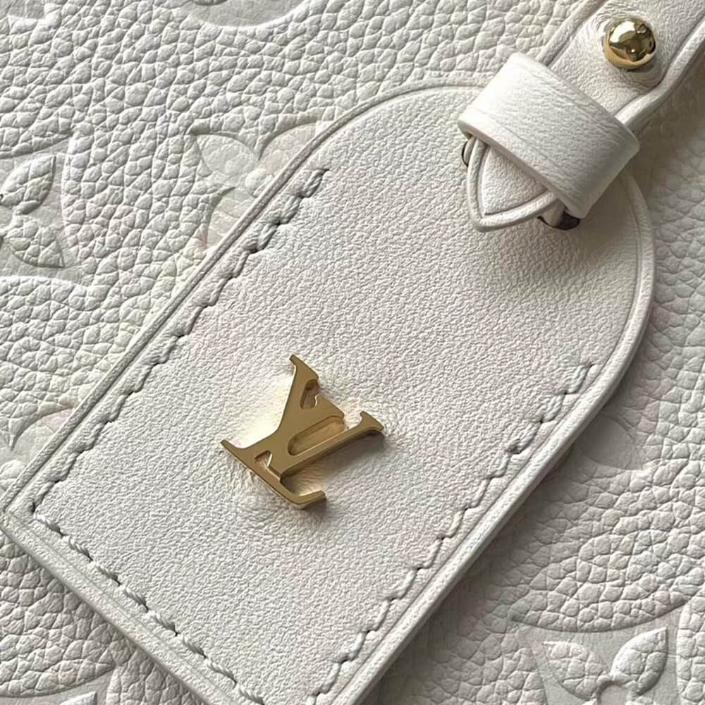 LV Petite Malle Souple Handbag